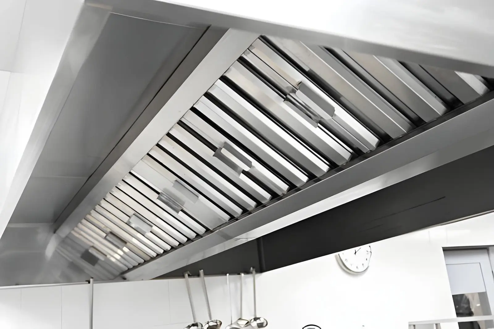 Restaurant Hood Installation connected to rooftop ventilation system for smoke and grease control